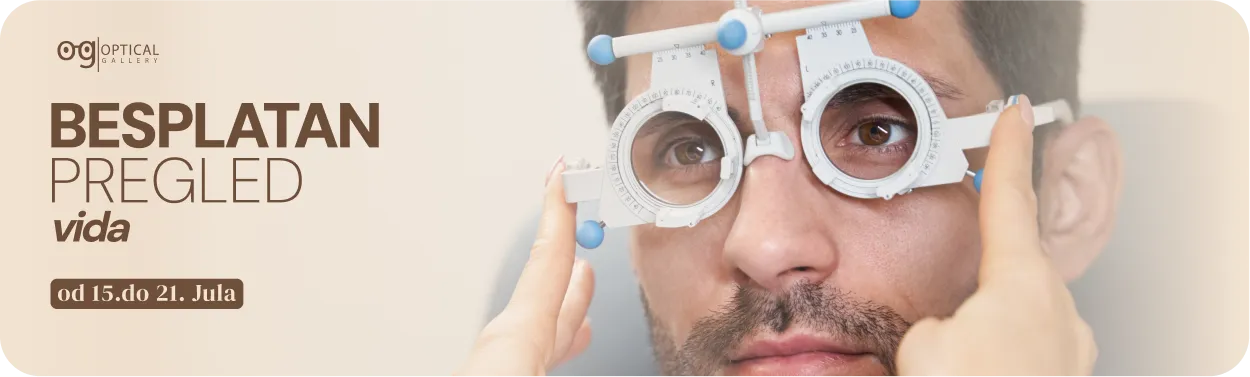 Man undergoing an eye examination wearing a trial frame used for vision testing.