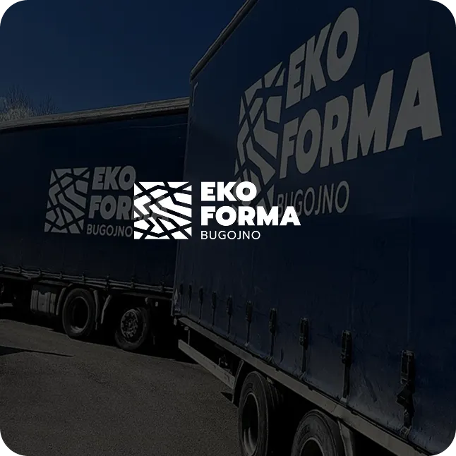 Blue trucks with EKO FORMA Bugoјno logo on their sides parked on a street.