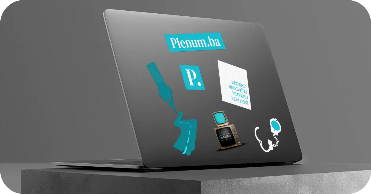 Gray laptop with Plenum.ba stickers including a fountain pen nib, TV, stethoscope, and text in Bosnian on the back cover.